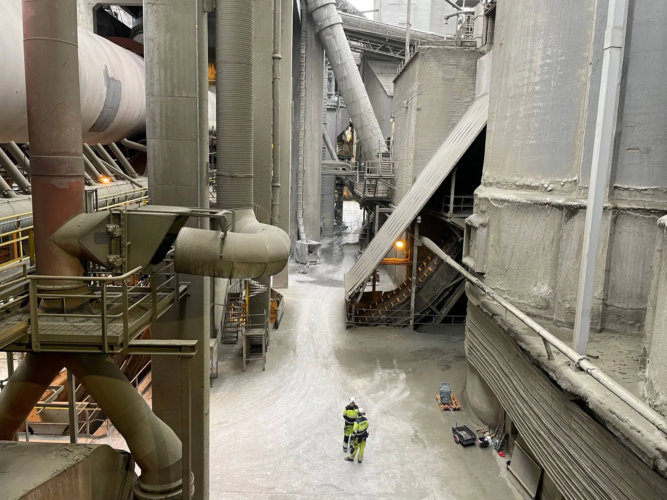 Industrial Plant Inspection Industrial factory workers inspecting machinery