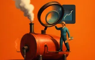 Man examining steam engine smoke